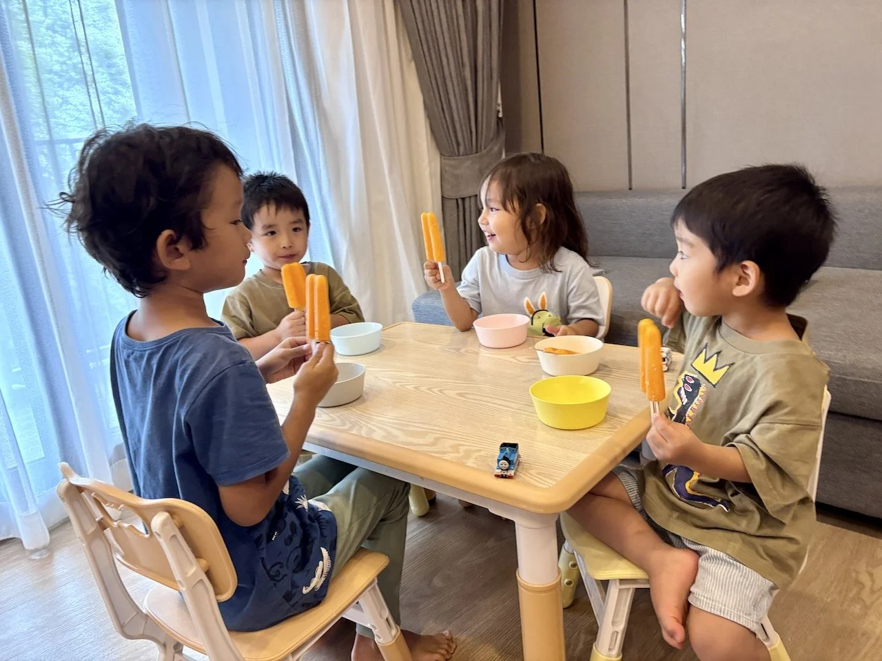 Enjoying popsicles that Lucy wanted to buy at swimming (for everyone)! A very smart choice, Lucy!