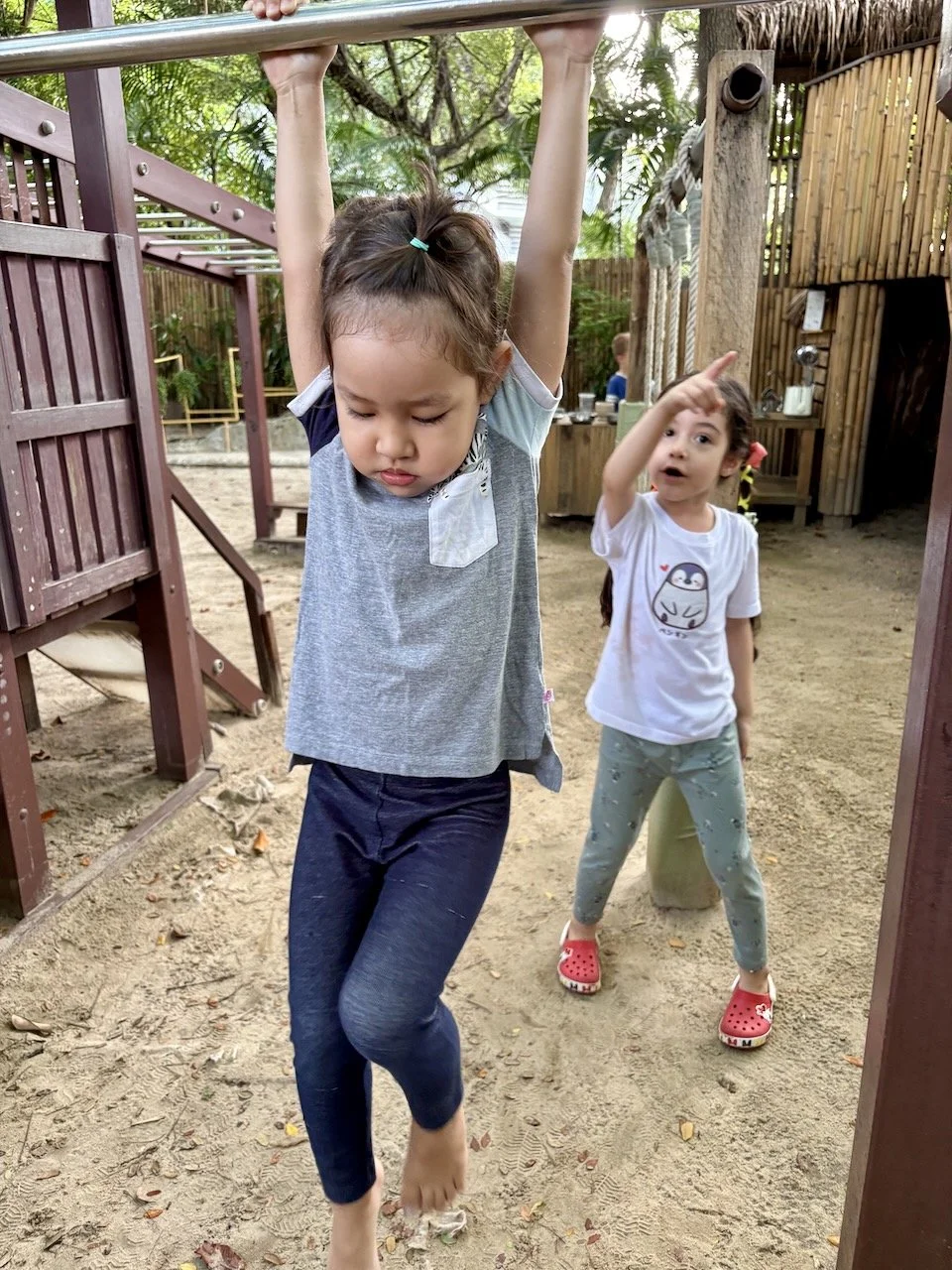 Hanging out with P'Mali, who's encouraging Lucy to improve her skills.