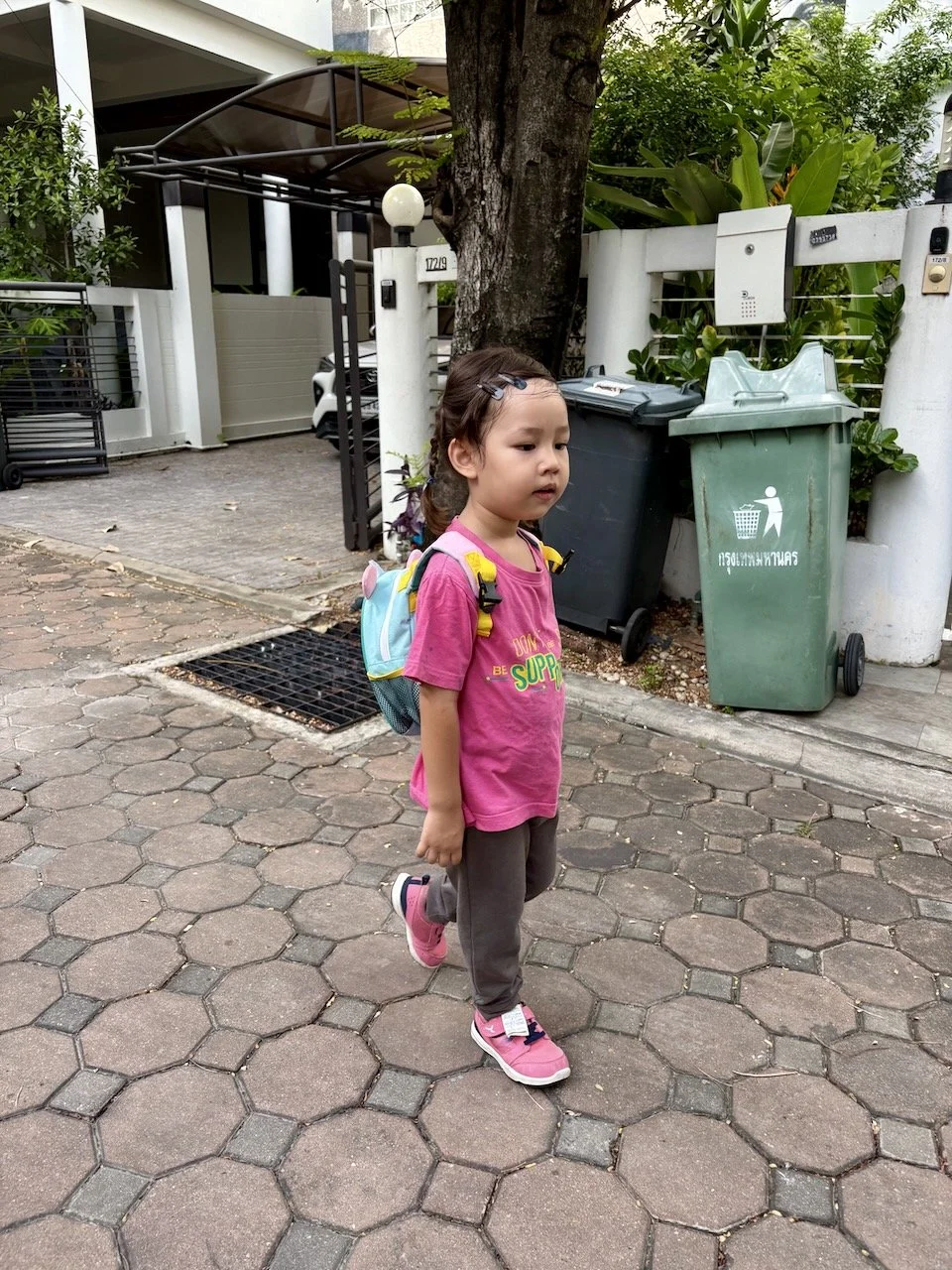 Taking herself very seriously this morning for school.