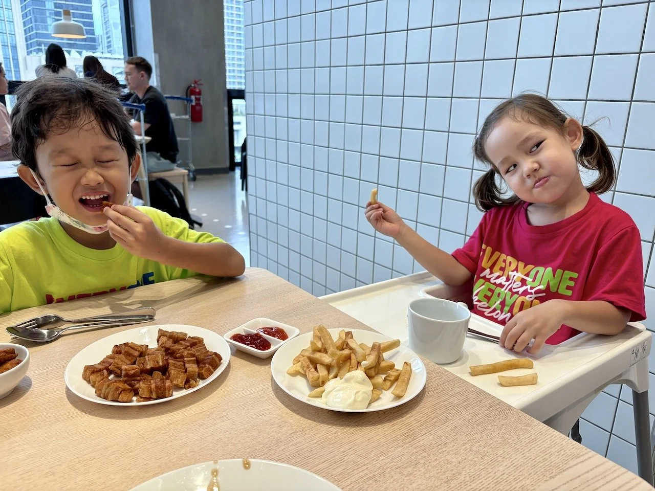 Arlo comes for the chicken nuggets, and Lucy for the rice and fries.