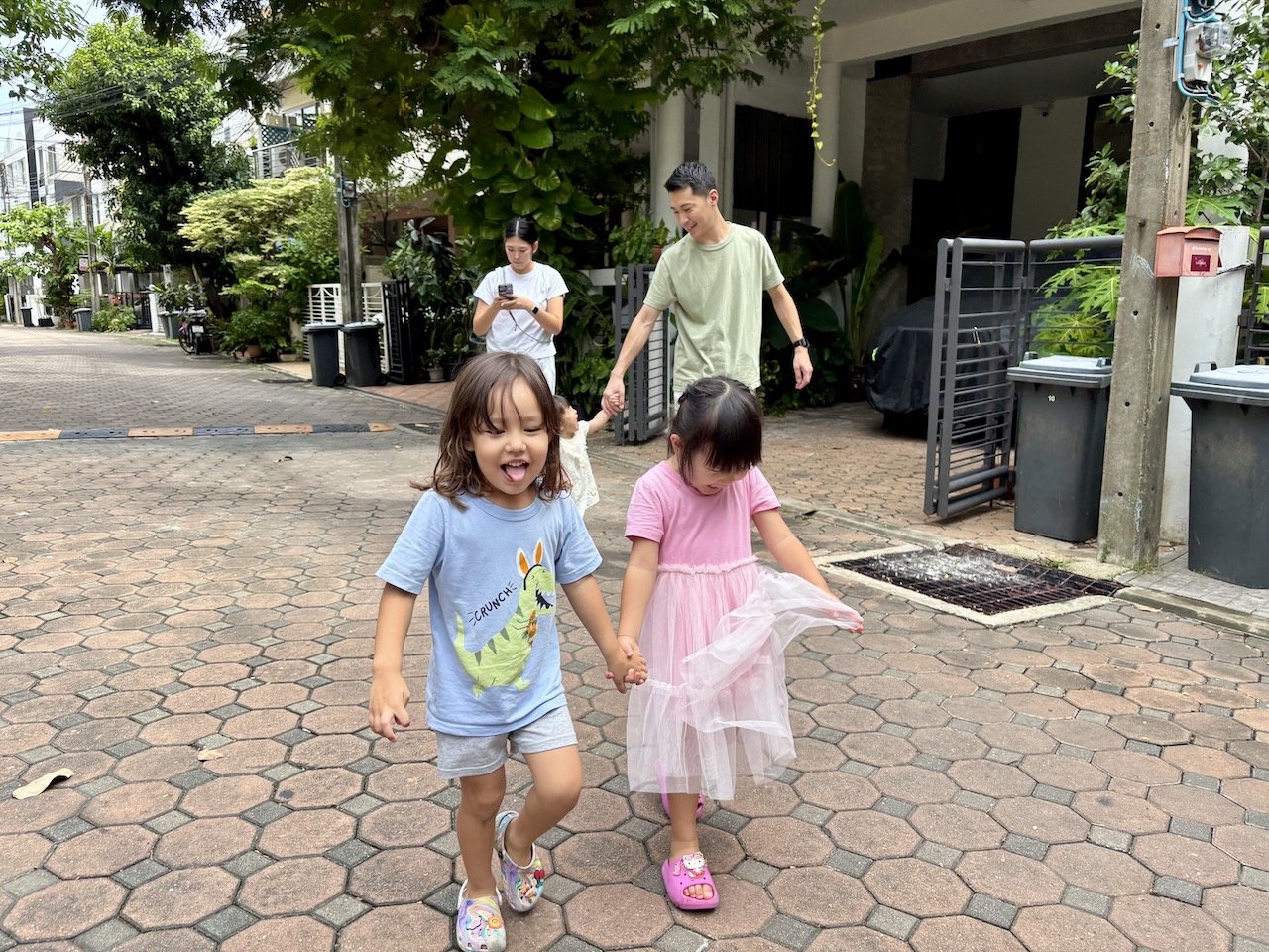 Heading to the playground, hand-in-hand.