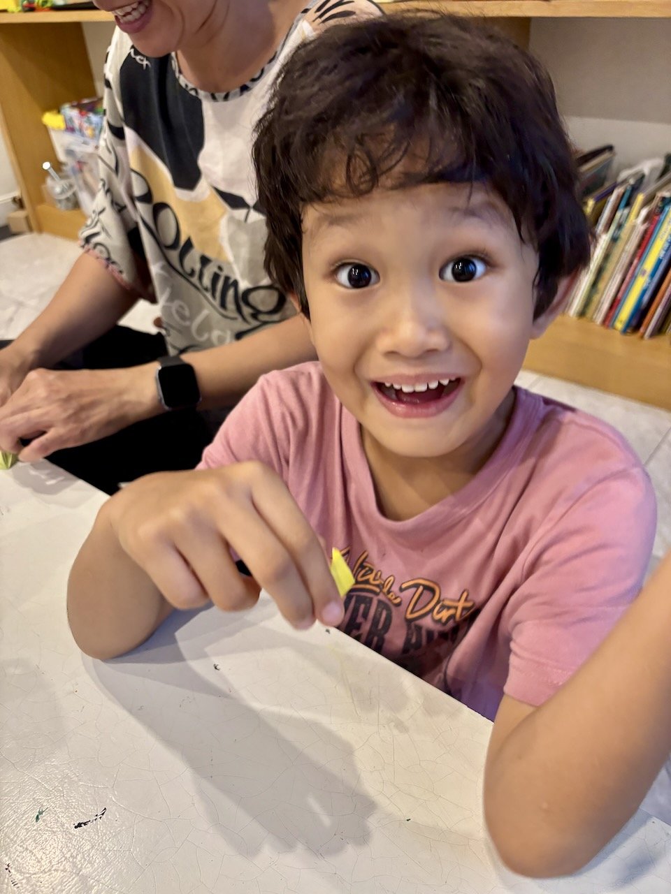 Folding more paper boats.