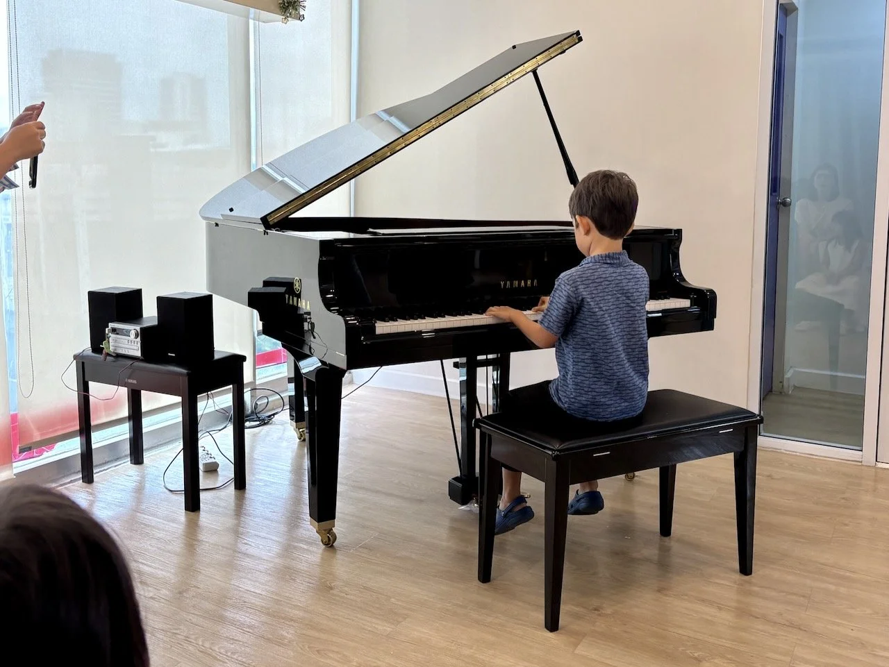 And then the playing. Arlo played two pieces, one of which was not actually part of the class's repertoire.
