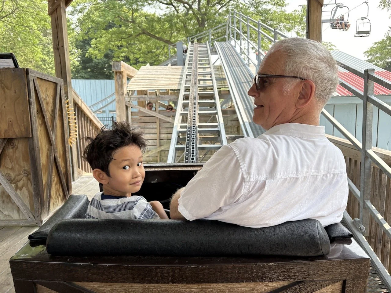Everyone's excited to ride the roller coaster!