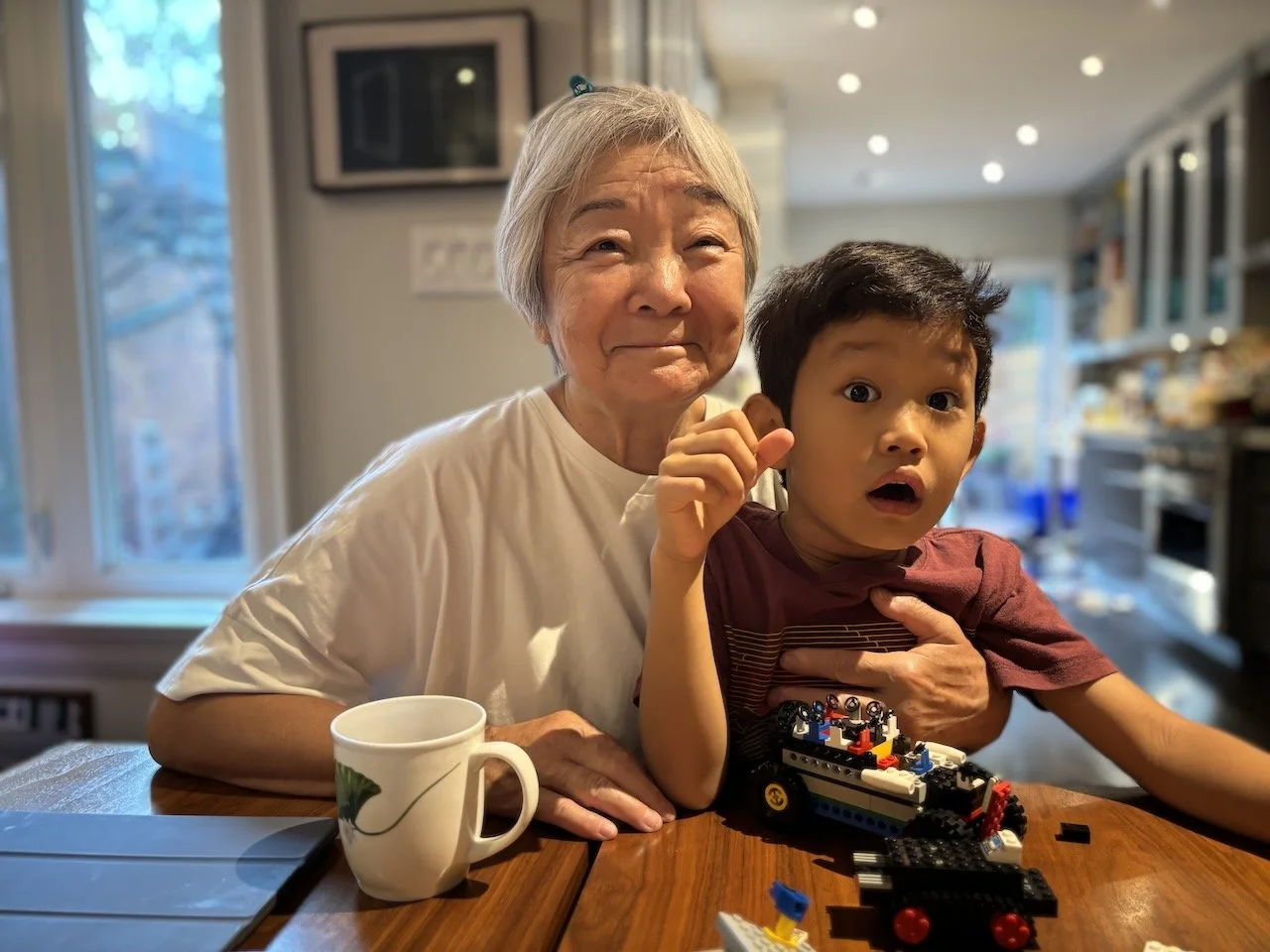 Showing Granny his creations.