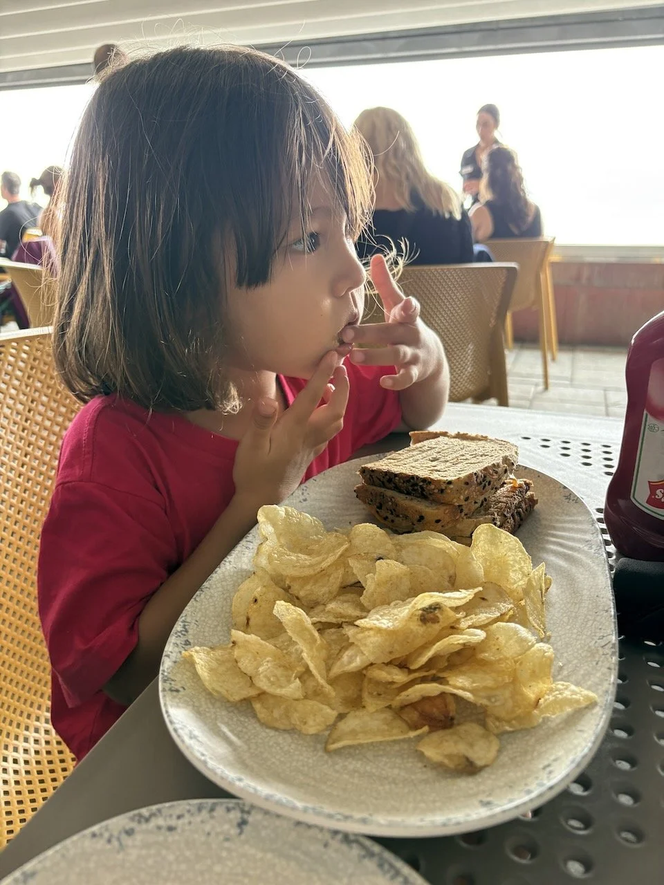 Lucy's all for the potato chips.