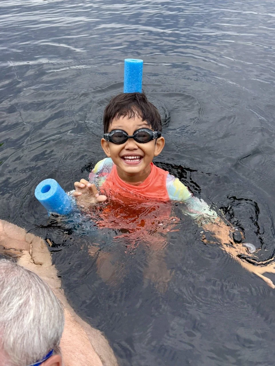 Brave Arlo is the first of the Thai contingent to go into the lake.