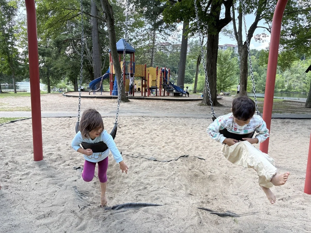 Learning that it's fun to "fly" on the swings.