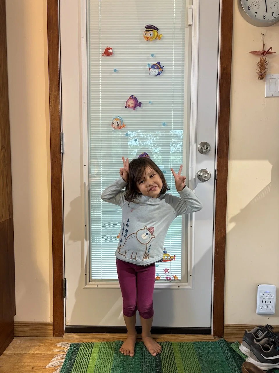 Lucy turns 3 years and 4 months old today; this is her "tree" photo in front of the door that Arlo has decorated.