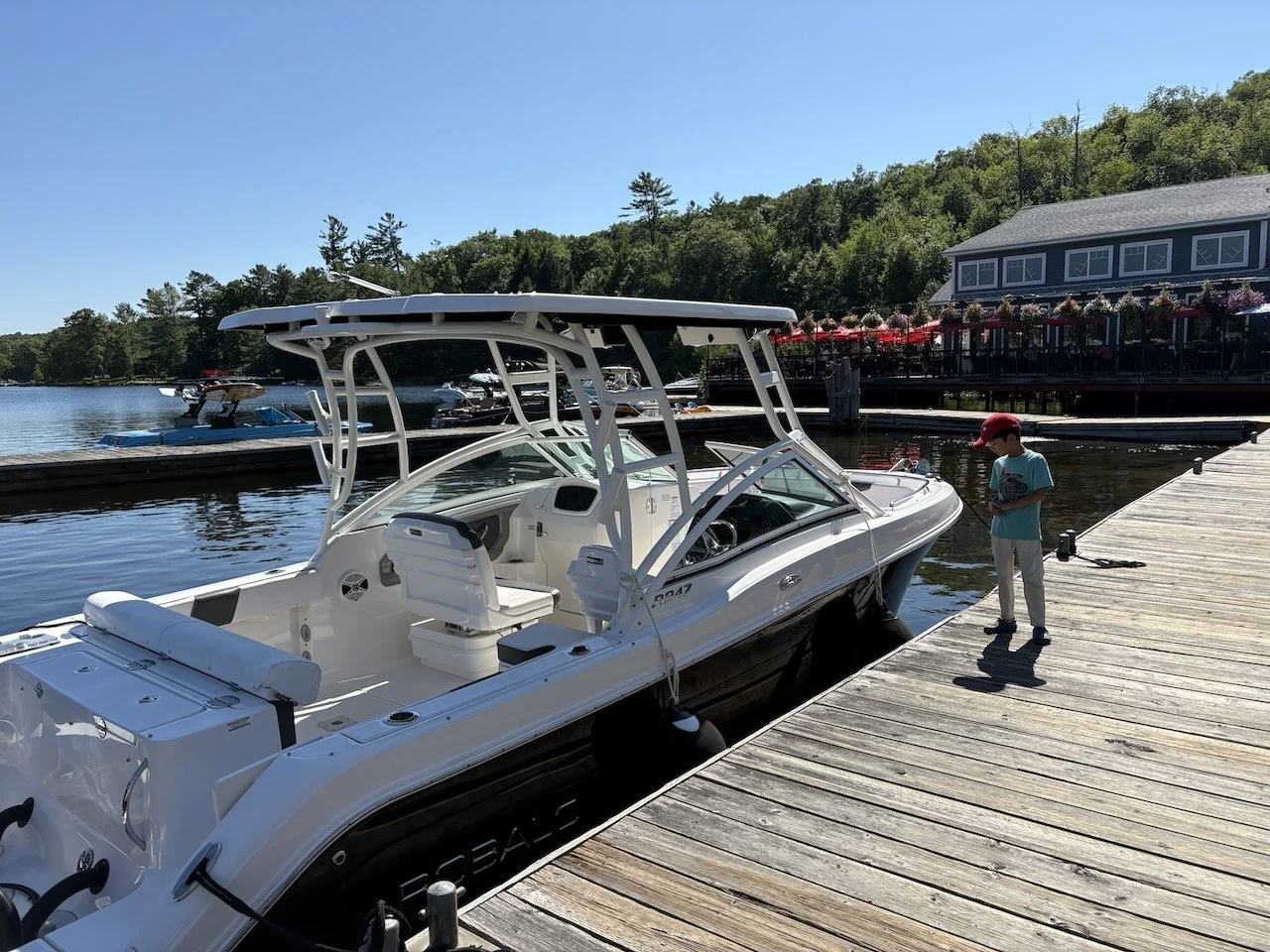 Admiring a boat he hopes to one day own.