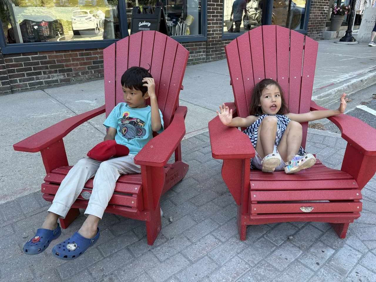 And trying on the town's Muskoka chairs for size.