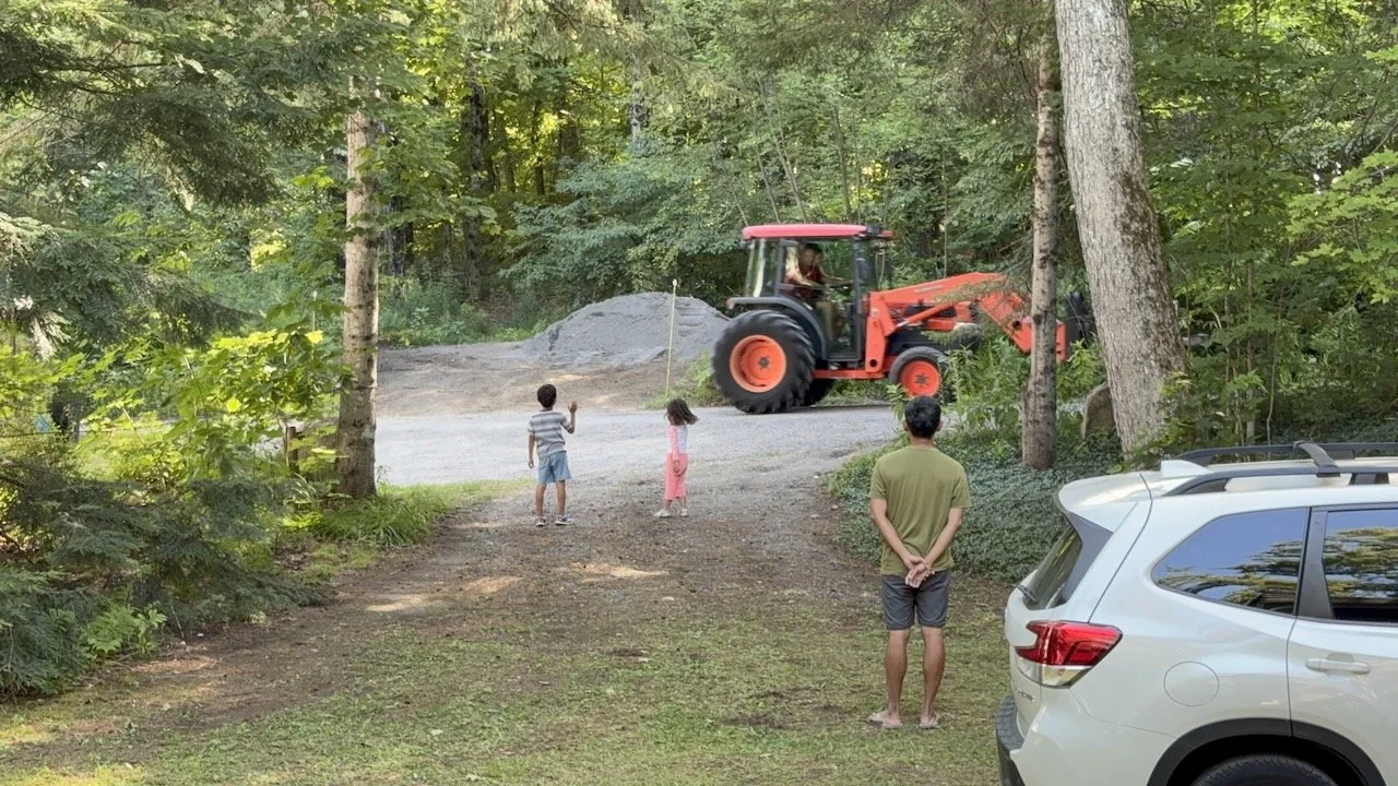 How exciting: a tractor drove by (twice) and they got a wave each time!