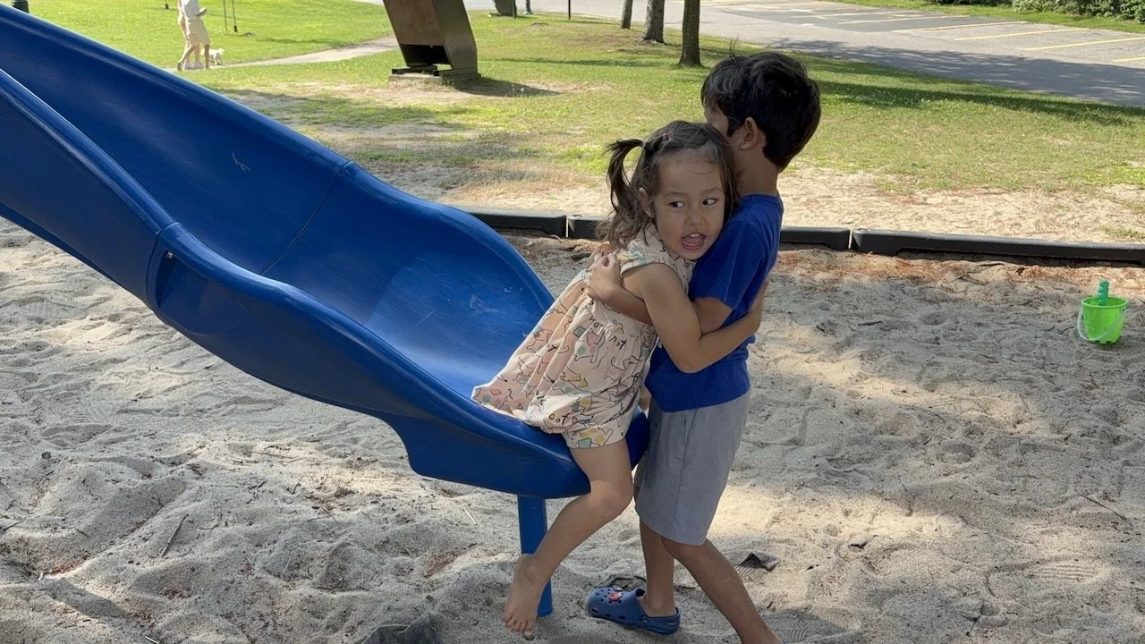 And Arlo even played helpful big brother, catching Lucy at the bottom of the slide.