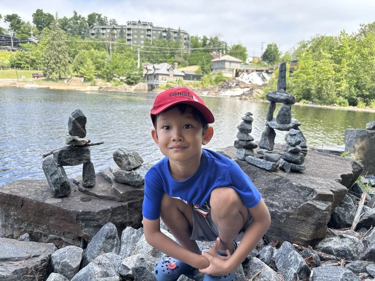 Posing with the falls and several Inukshuk.