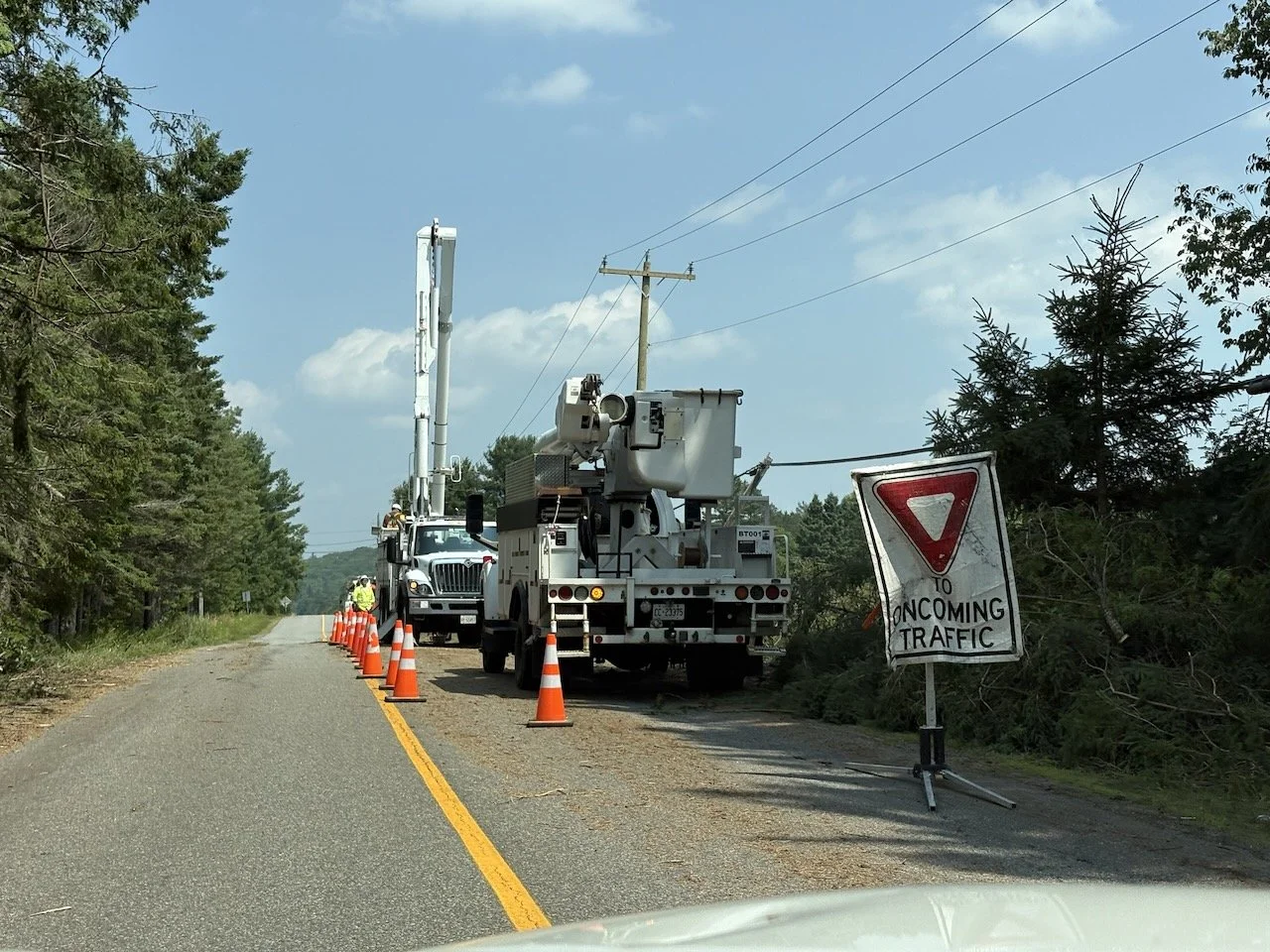 Back at the cottage, the power is not back yet, but they're working away at it.
