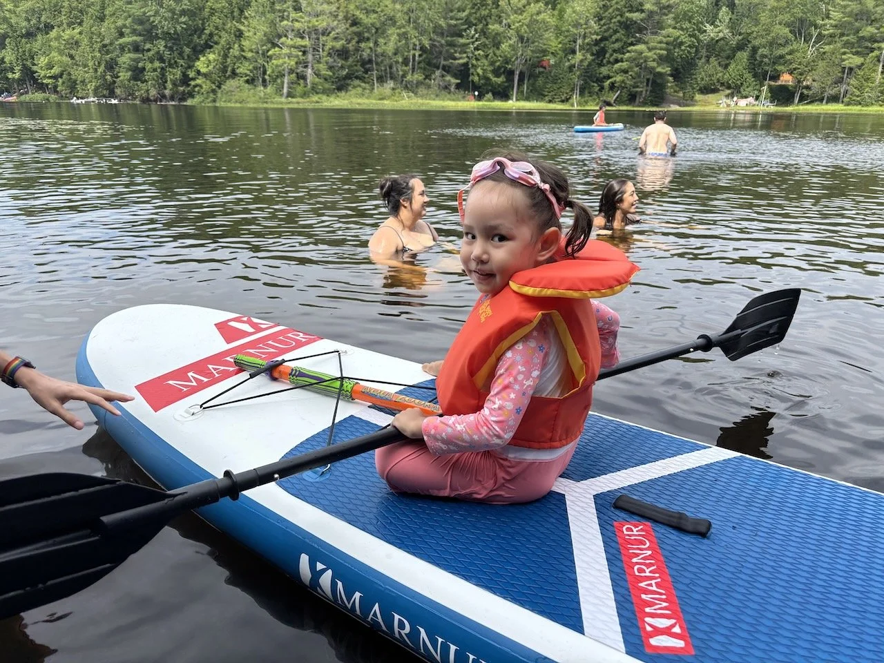 With a little time and lunch, Lucy now has the confidence and ambition to try the paddle board, too.