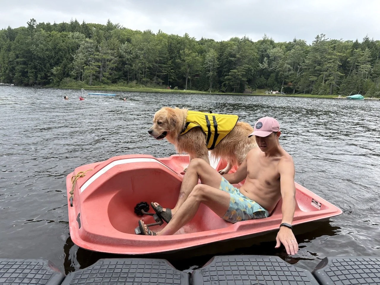 Mackie's trying on his life jacket... he was a good sport.