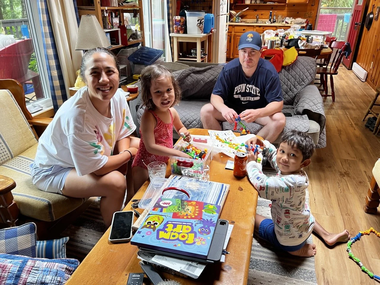 More being spoiled by Auntie Julia & Uncle Taylor.