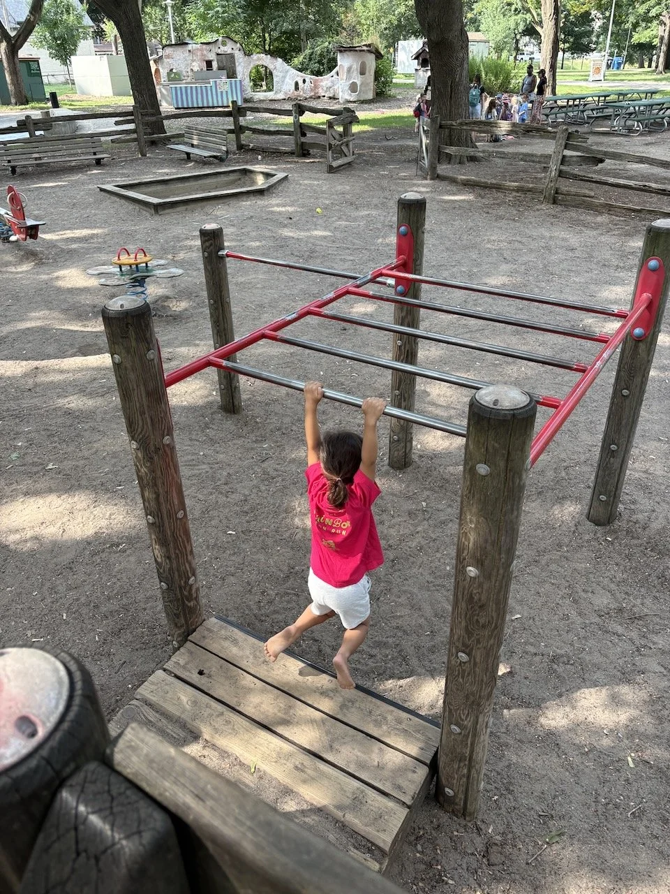 On Wednesday morning, we made one last trip to Lucy's favorite playground (with the short monkey bars).