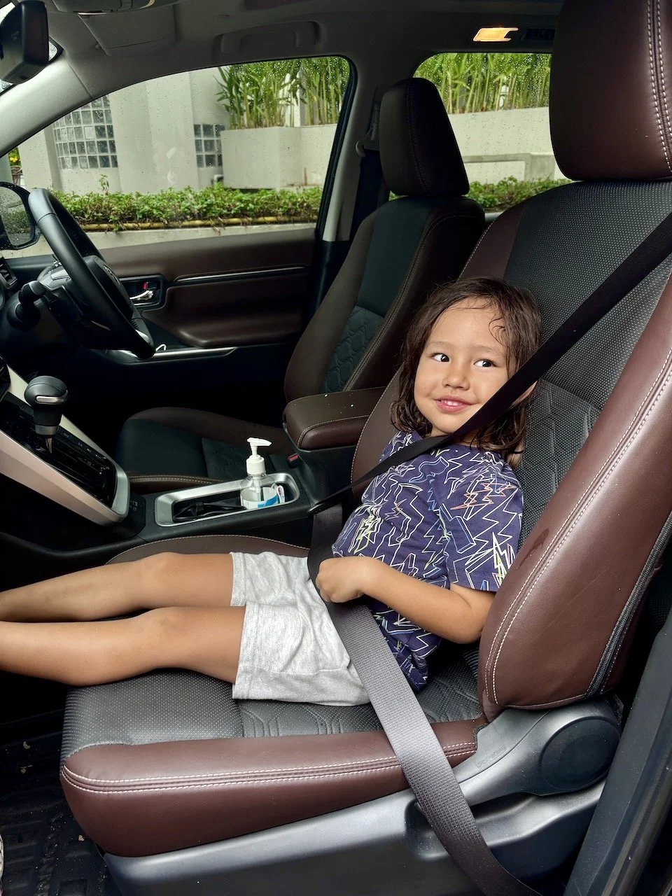 Playing in the big car?