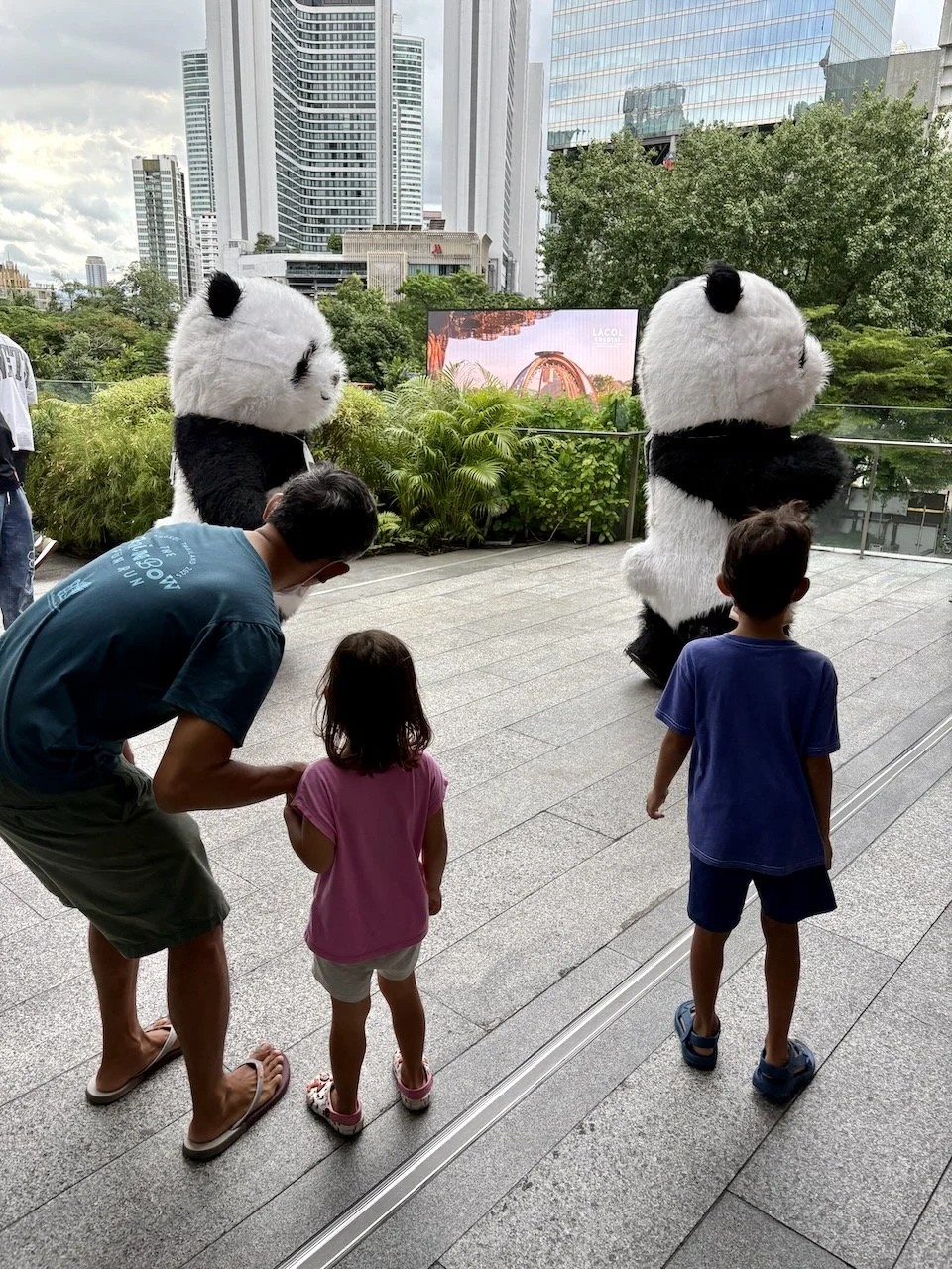 Surprise! We found (and joined) a parade of pandas.