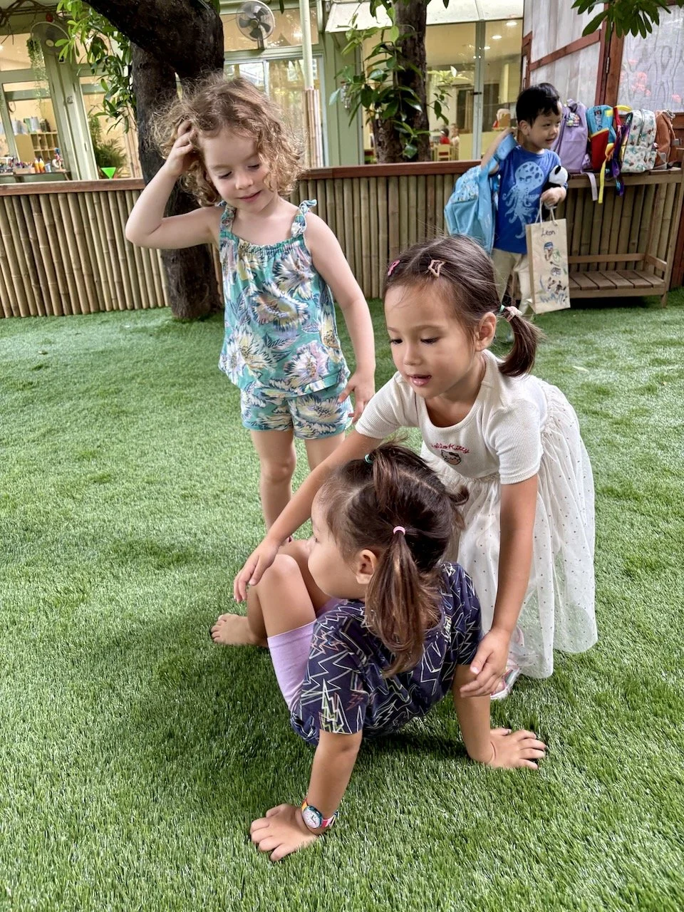 Hugs for Lucy from her besties, as they part ways for class.