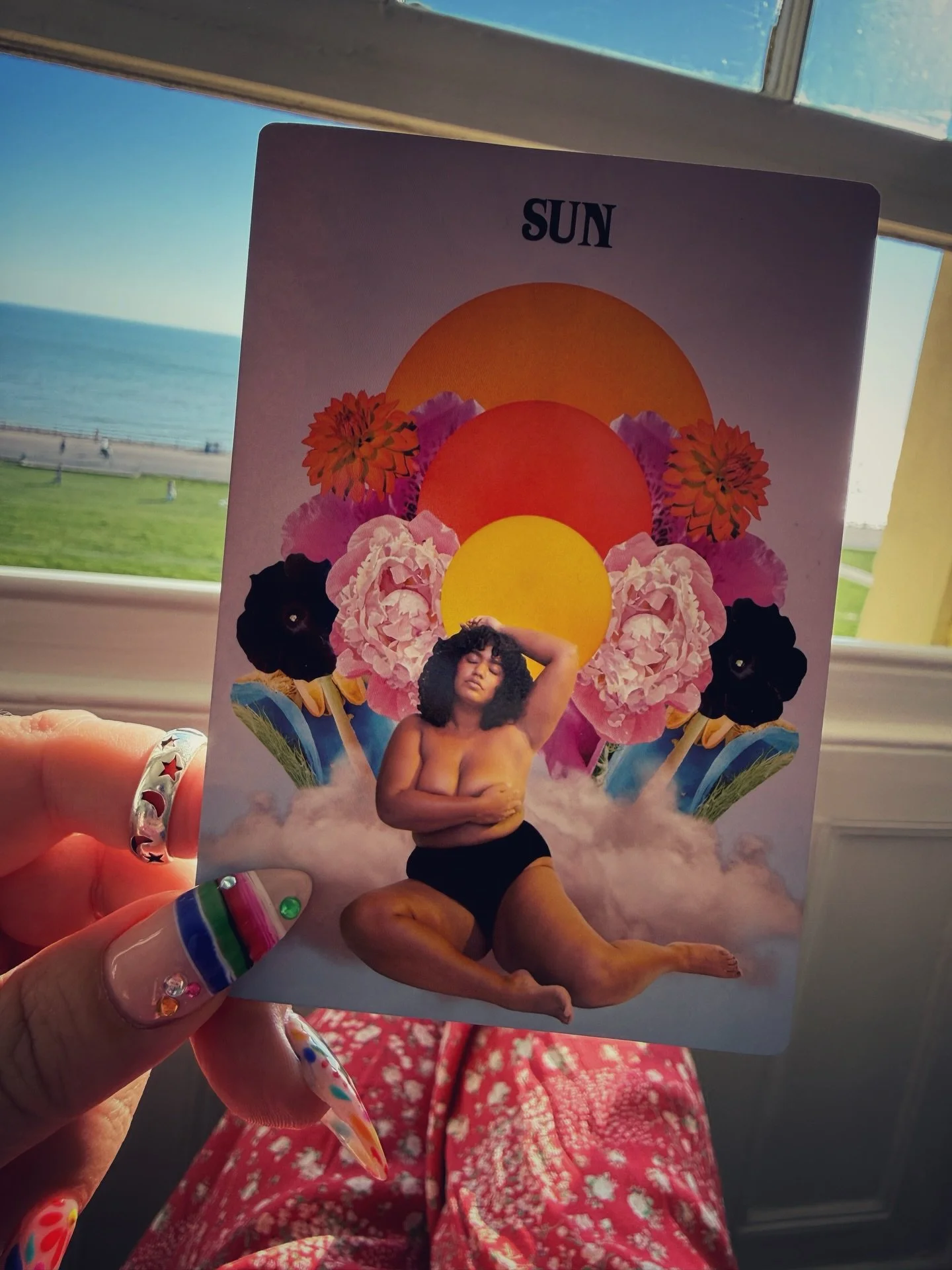 I pulled this card for a reason.

This card is about visibility. Being fully seen, the real you, not the version you&rsquo;ve decided is safe enough to share. The ICONIC you.

And I see so many women in business holding back. Showing up but staying i