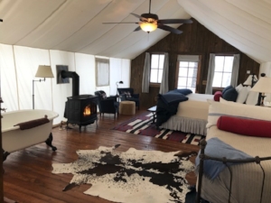 Stunning Canvas tents with wood burning stoves.