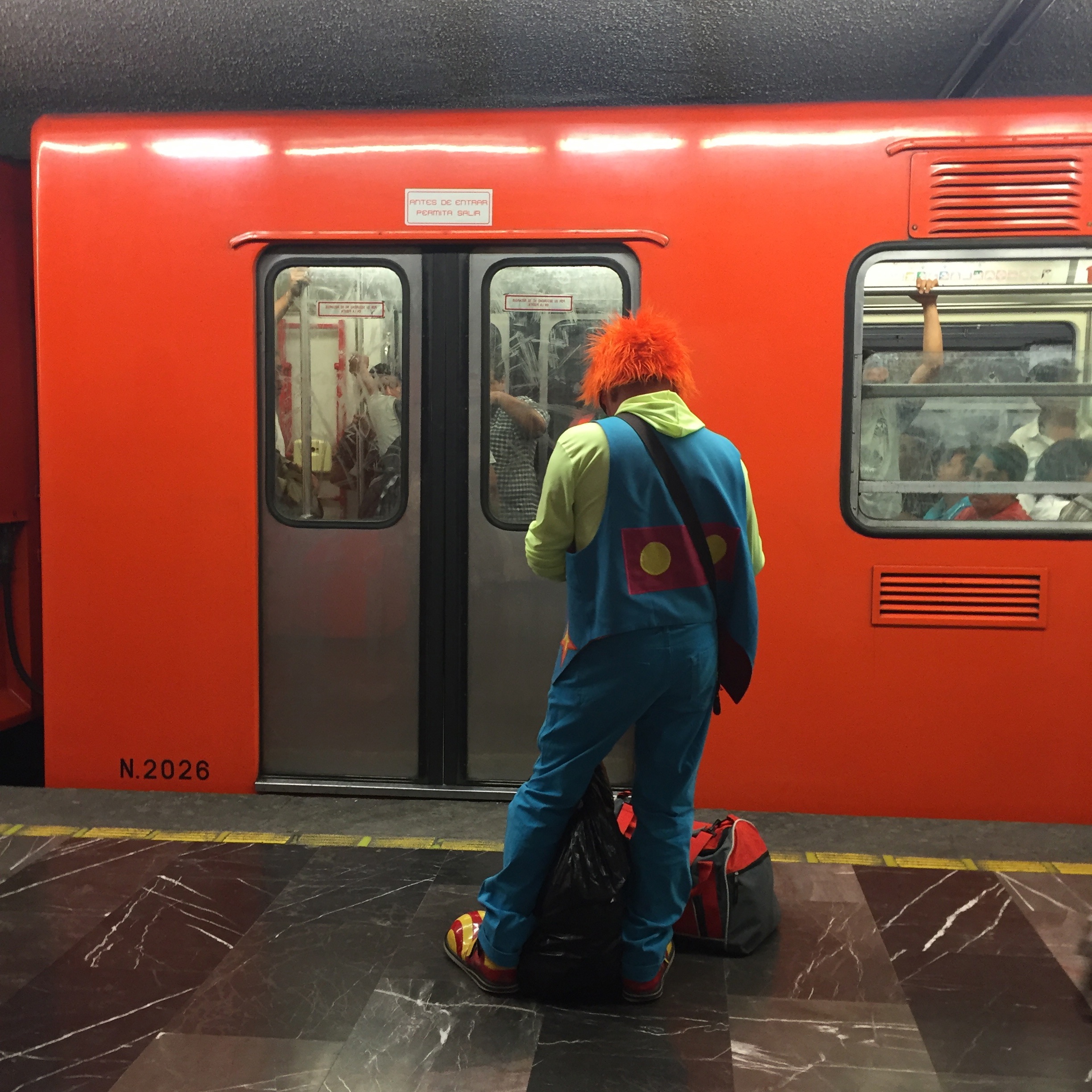 CDMX Clown in Metro, 2015, digital photo
