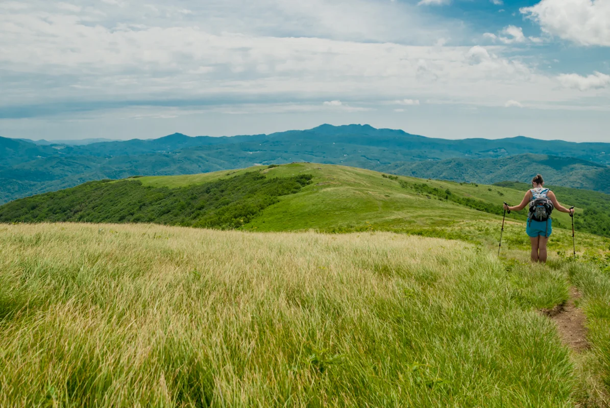 Hiker stops for a break on bald mountain