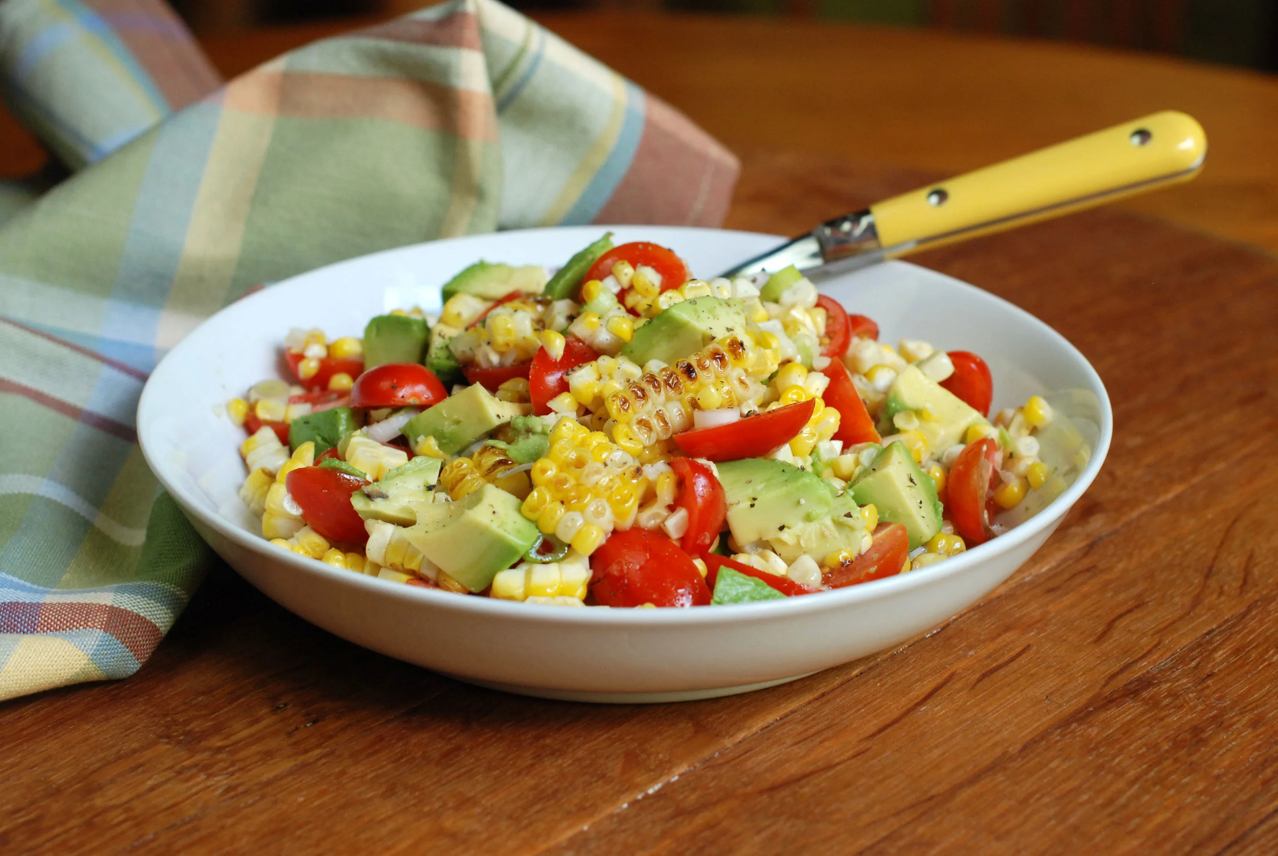 Grilled corn, tomato and avocado salad