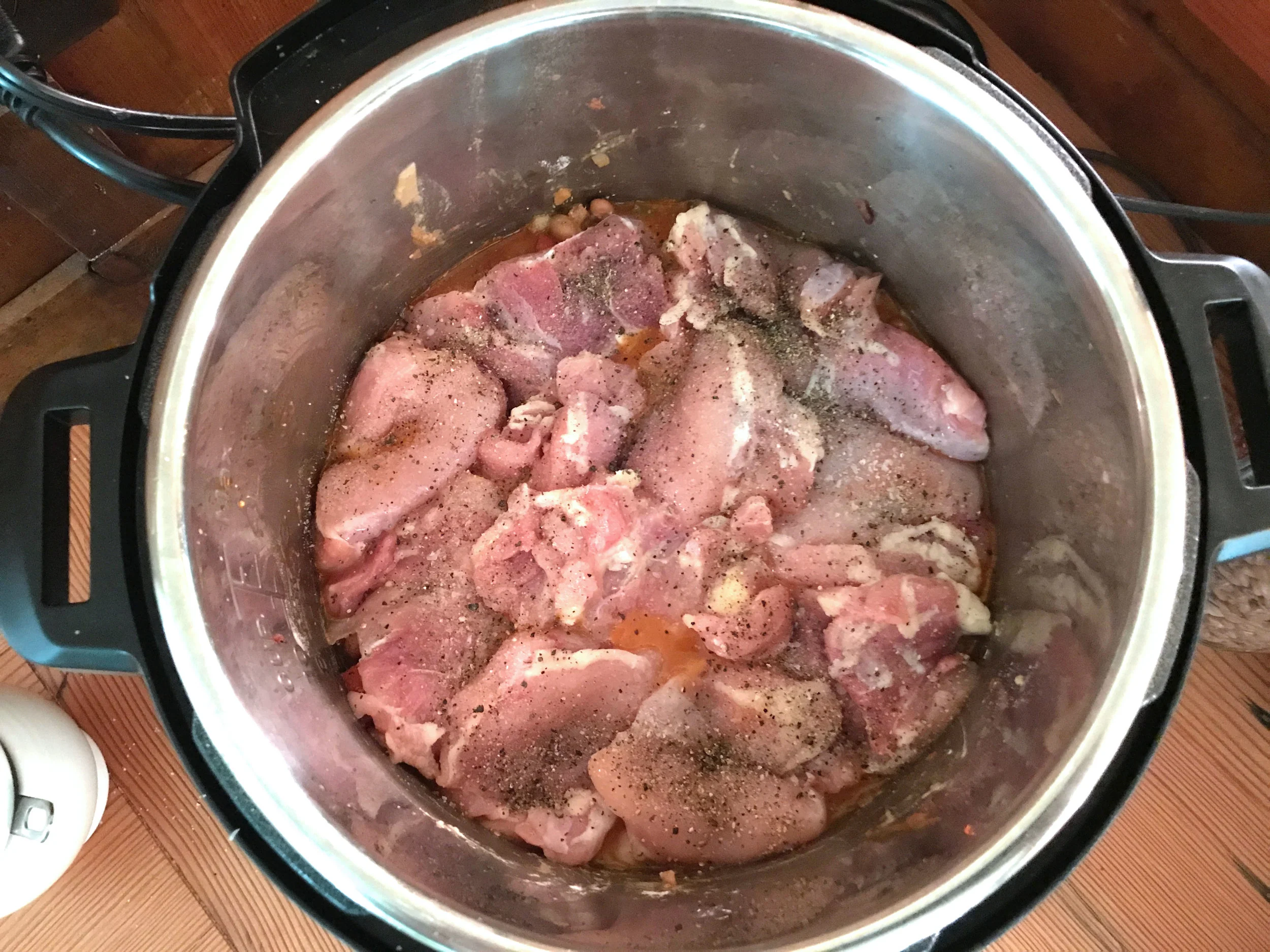 Everybody in the pot! Chicken on top!