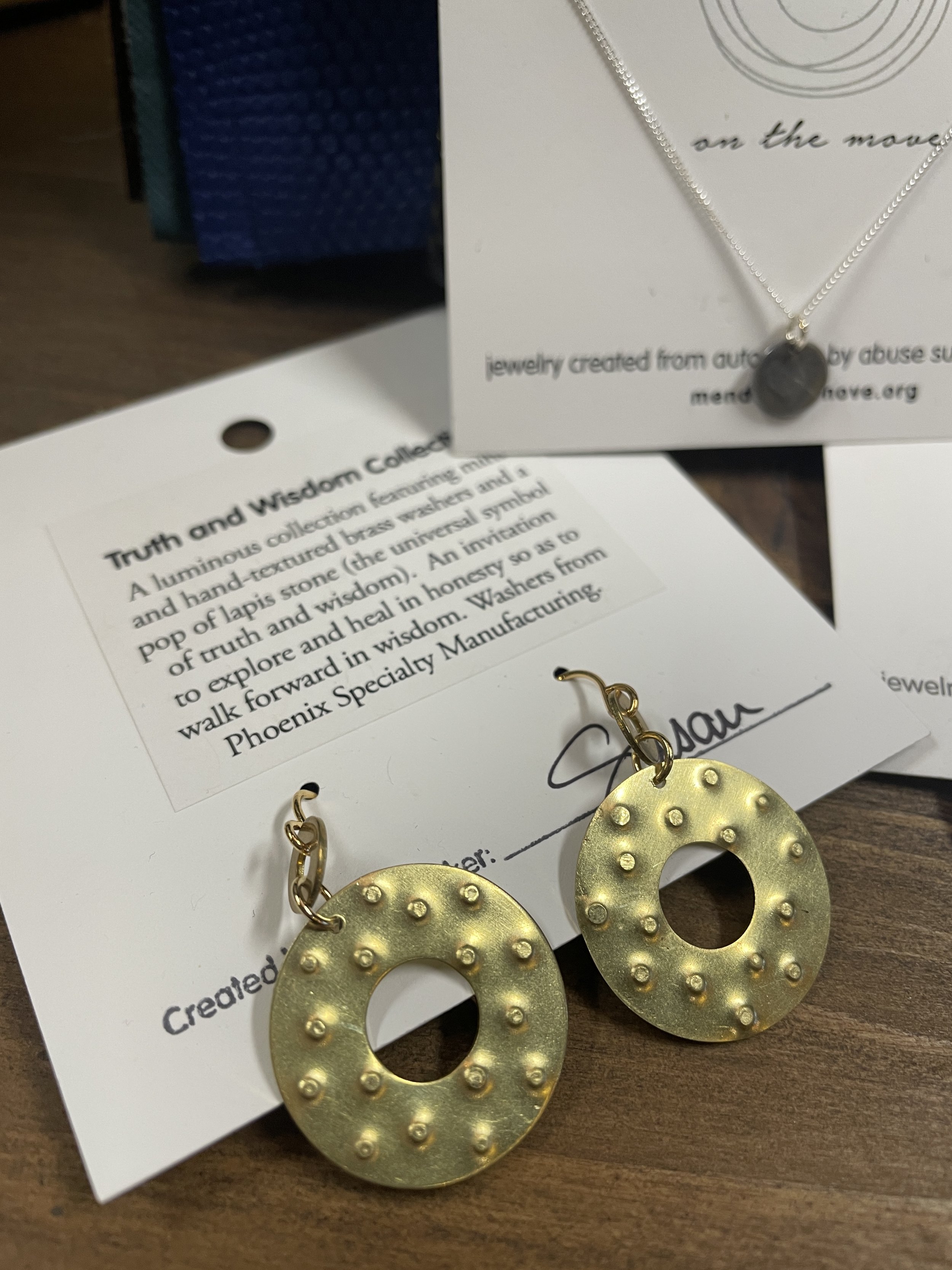 Mend Truth and Wisdom Collection  $31.95 - mini hand textured brass washers - jewelry created from auto parts by abuse survivors in Detroit