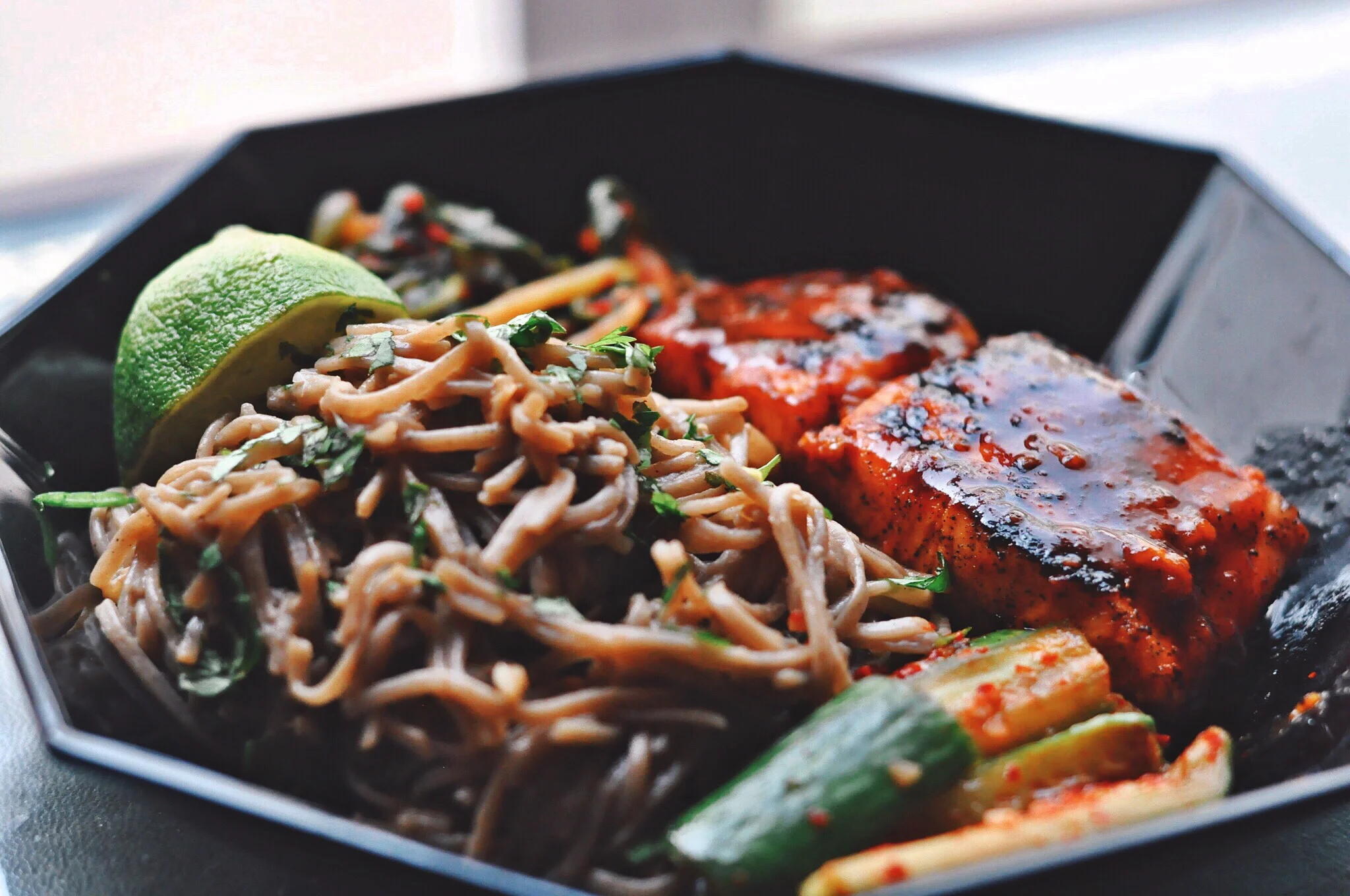 Sweet and spicy salmon with sesame peanut noodles