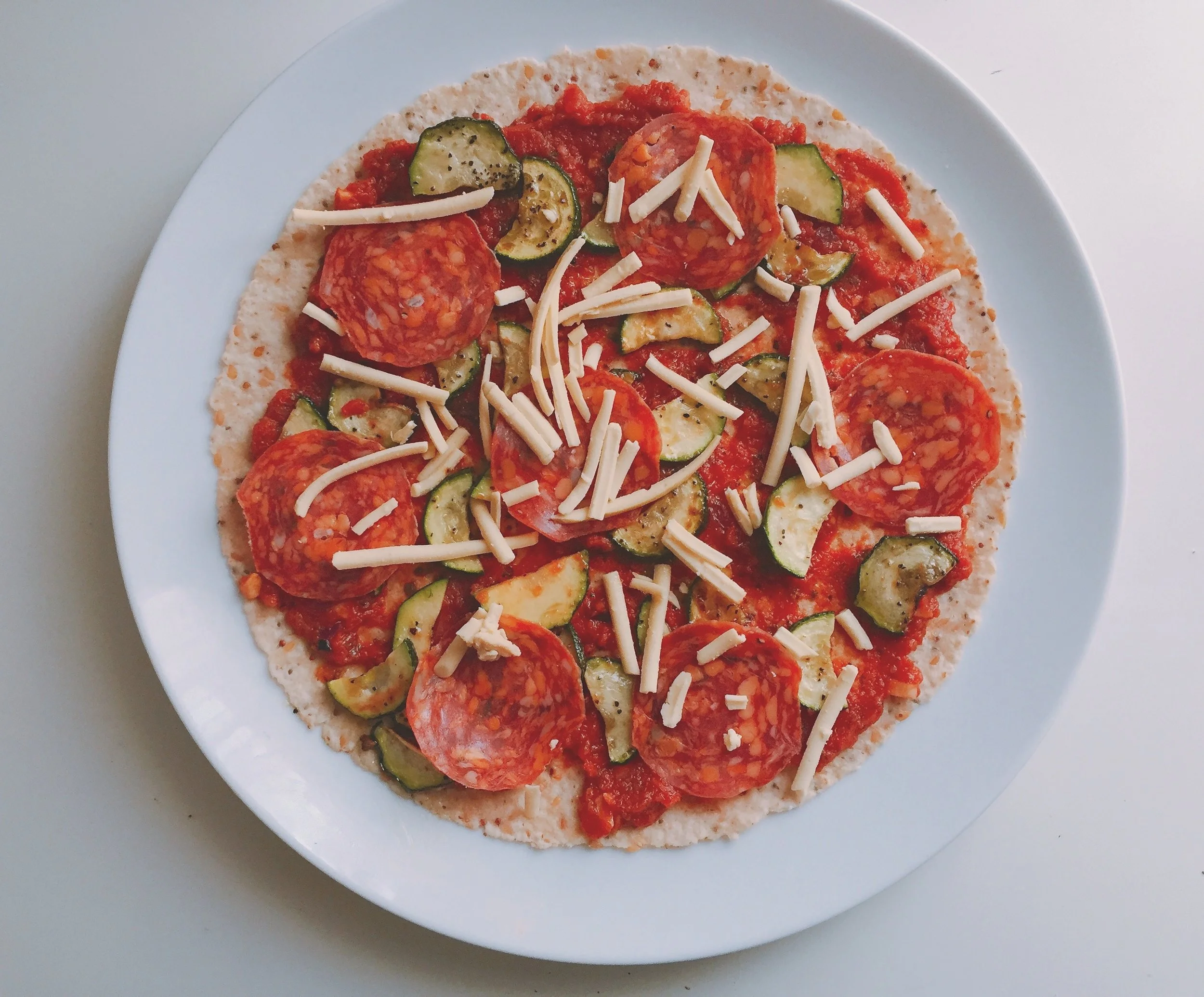 Toasted pepperoni and courgette pizza wraps