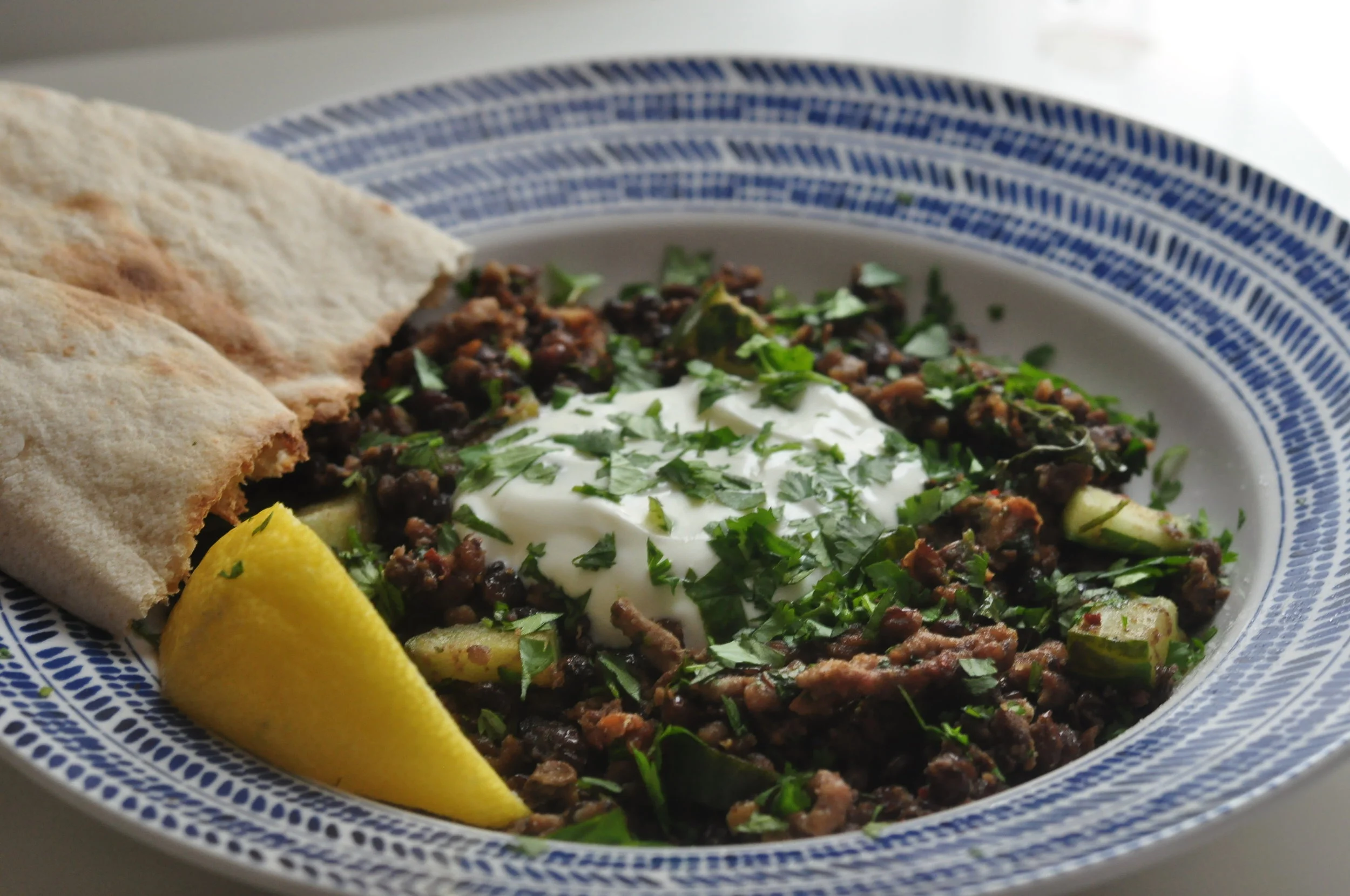 Spicy lamb and lentils with herbs