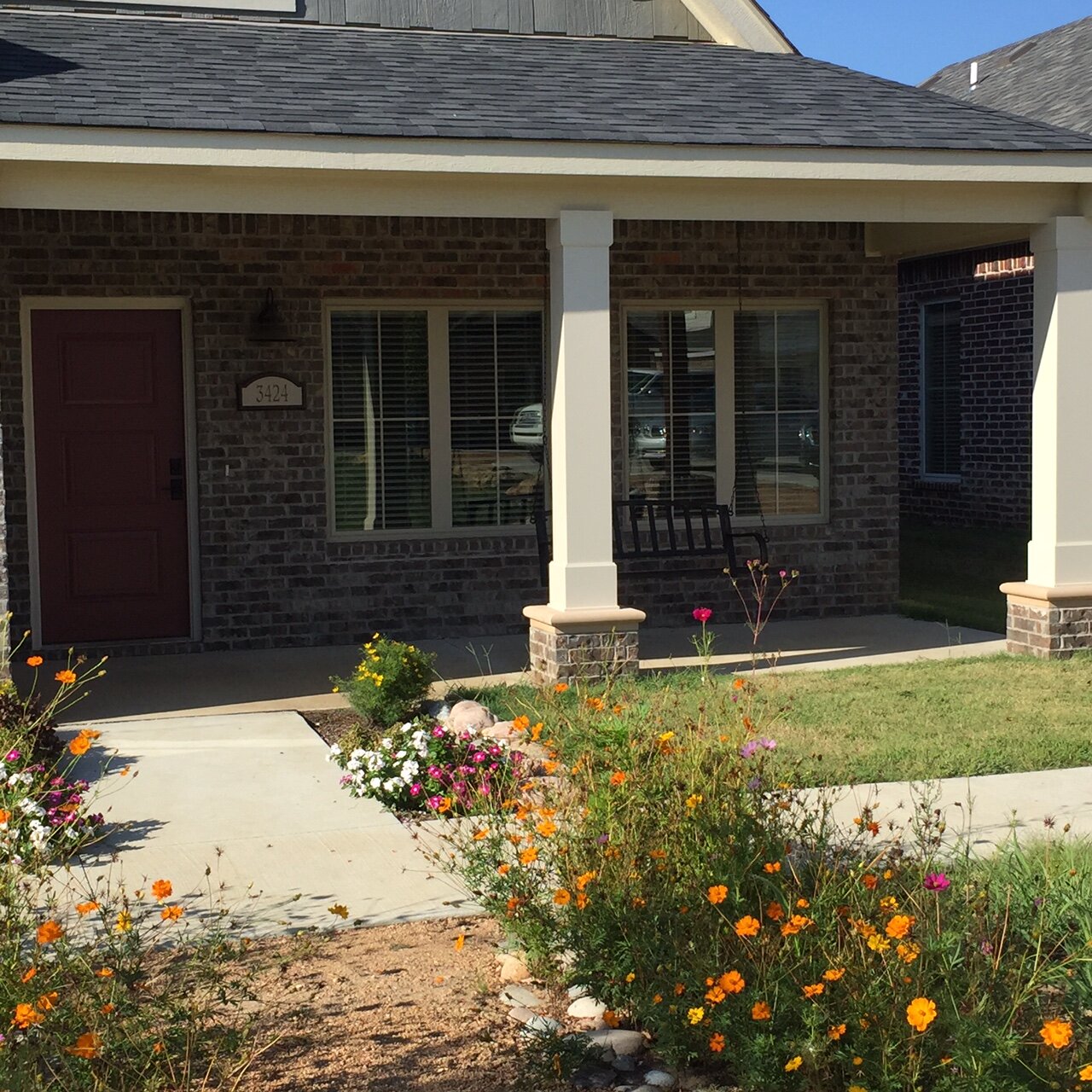 3424 Franklin Bungalow Front porch wildflowers.JPG