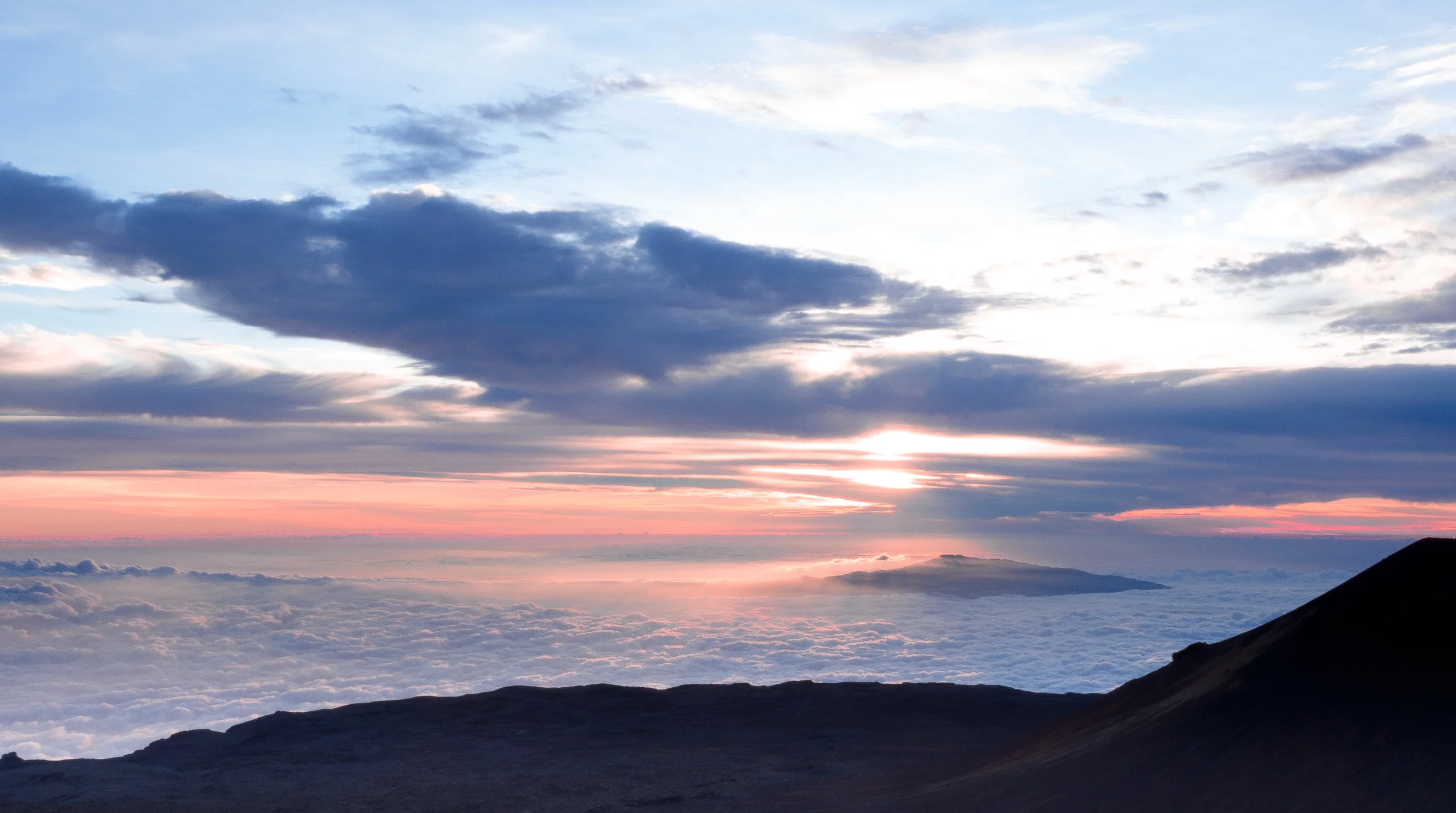 How about watching the sunset above the clouds from the top of a (dormant) volcano?!