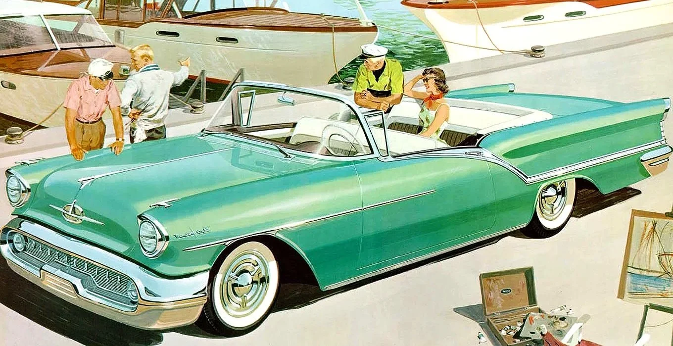 1957-green-oldsmobile-starfire-88-convertible-print-ad.jpg