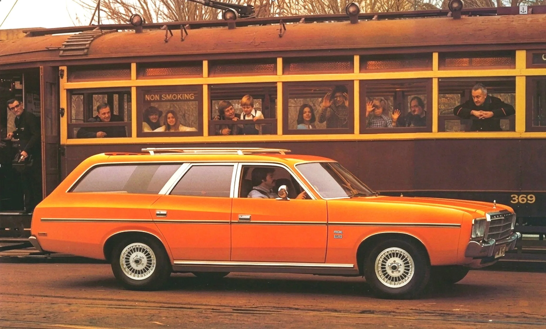  1977 orange Chrysler CM Regal station wagon - original print brochure. 