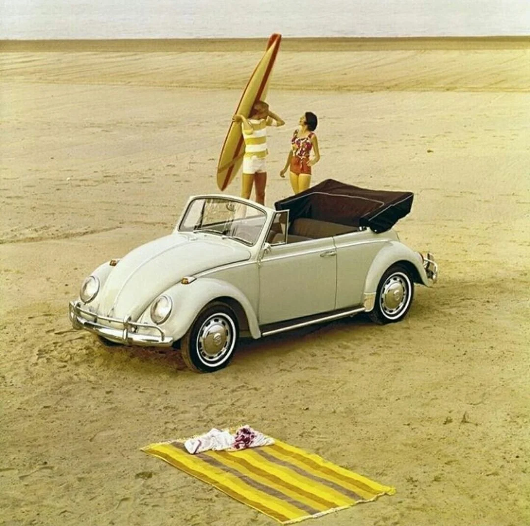 1965-volkswagen-vw-beetle-convertible-beach-surf-ad.jpg