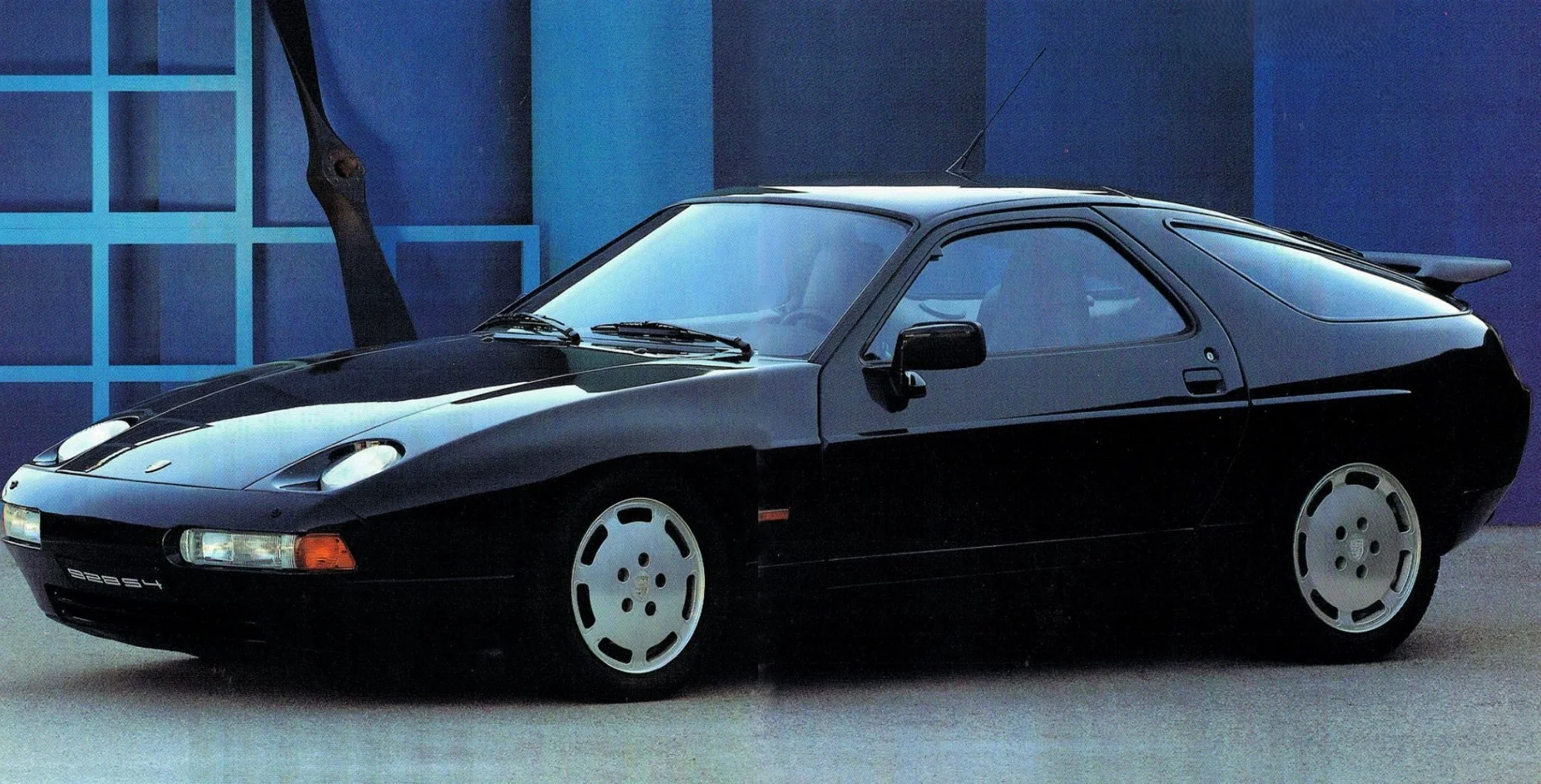 1991-black-porsche-928-s4-coupe-print-ad.jpg