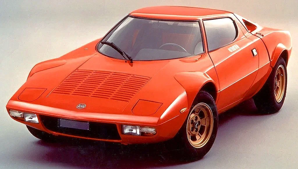 Historic 1970s factory press photo of a red Lancia Stratos. Click to browse the Lancia vintage media and engineering brochure gallery.