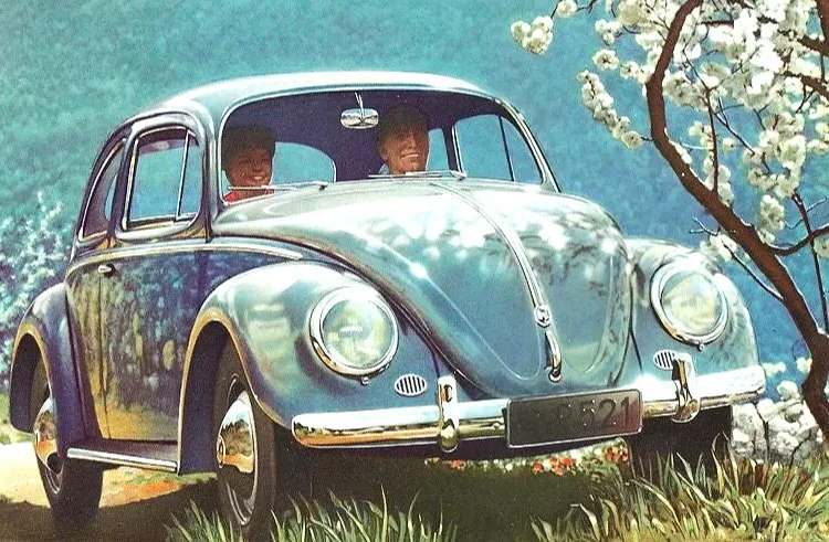 Collection of original air-cooled Volkswagen advertisements featuring the Beetle, Transporter, and Karmann Ghia.