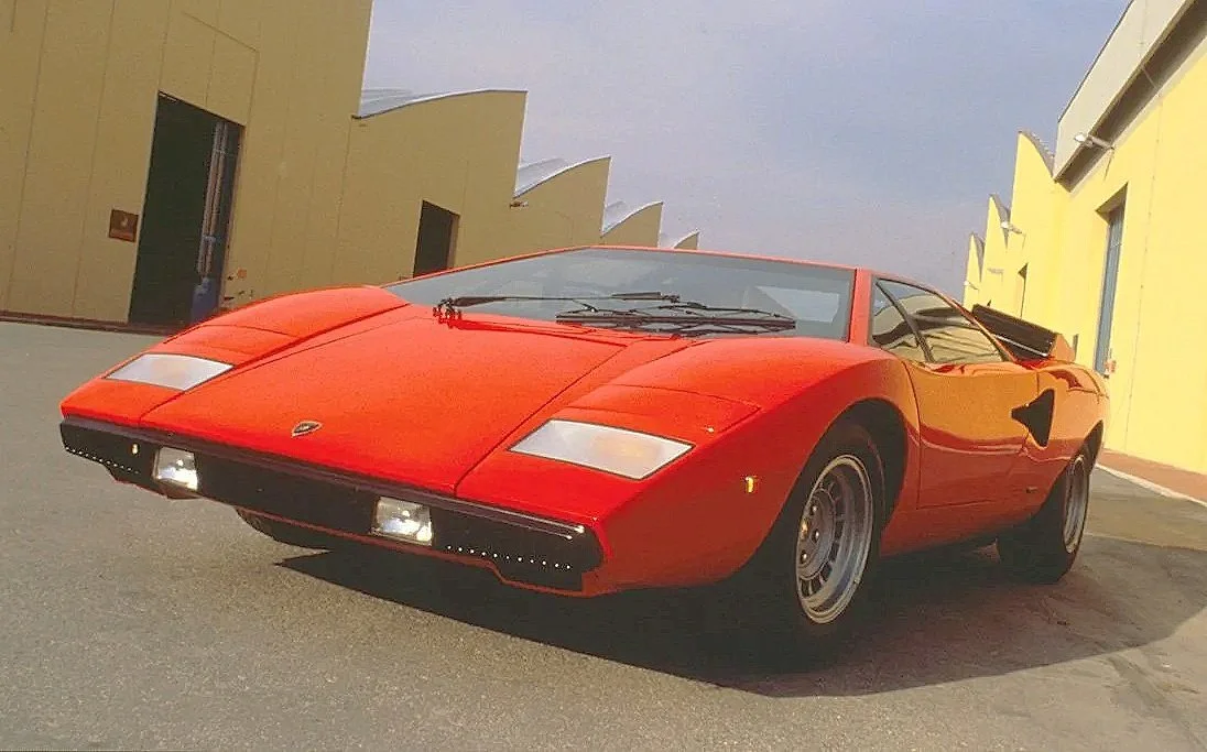 Vintage 1973 factory photo featuring a wedge-shaped Lamborghini Countach. Click to explore the Lamborghini historic factory media archive.