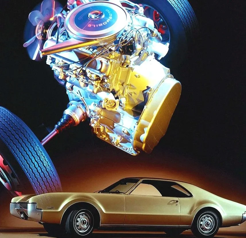 Link to the Oldsmobile Toronado advertising archive (1966-1978) featuring high-resolution scans of the first-generation front-wheel-drive luxury coupe and Rocket V8 engine specs.