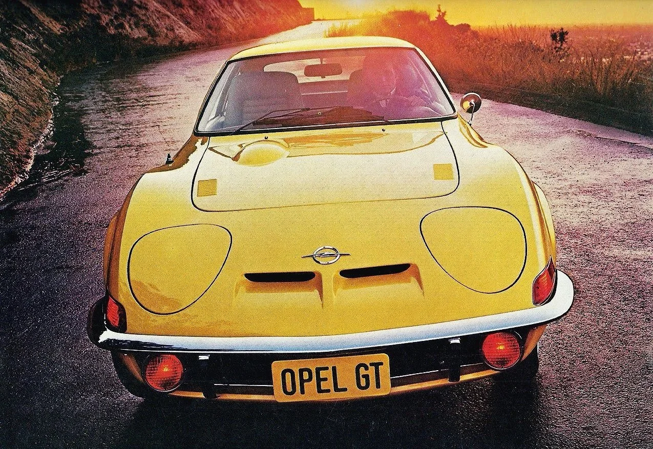 Original Opel print advertisement archive showcasing 1970s models like the Manta, GT, and Commodore.