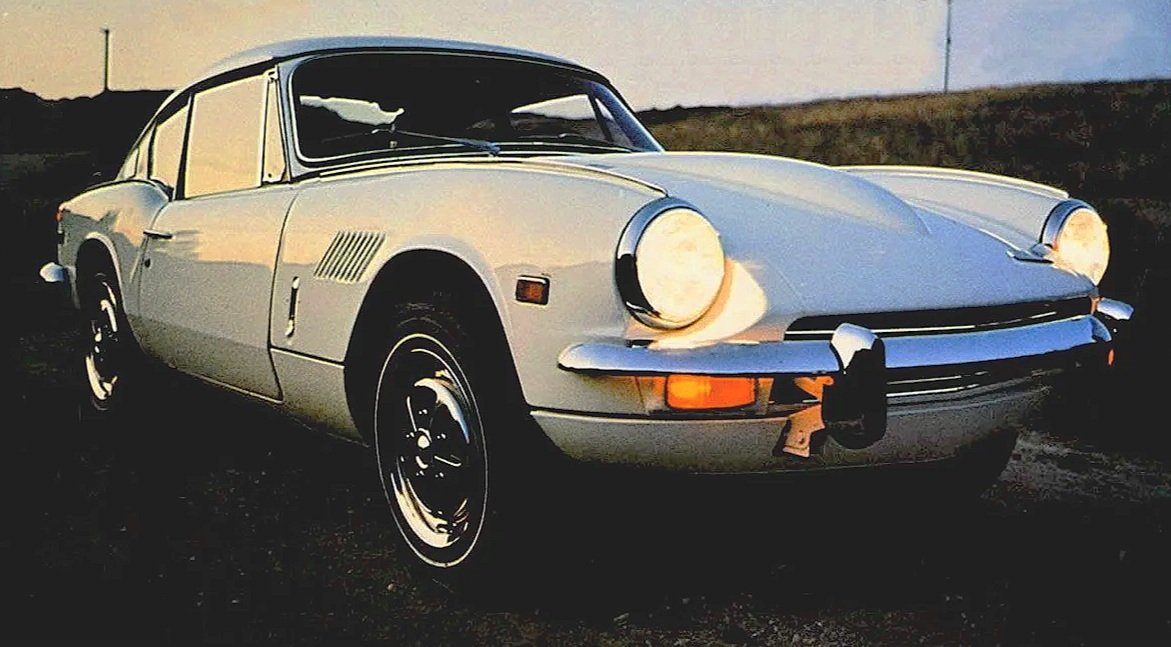 An archive of original mid-century magazine adverts and promotional media featuring classic Triumph sports cars, coupes, and roadsters.