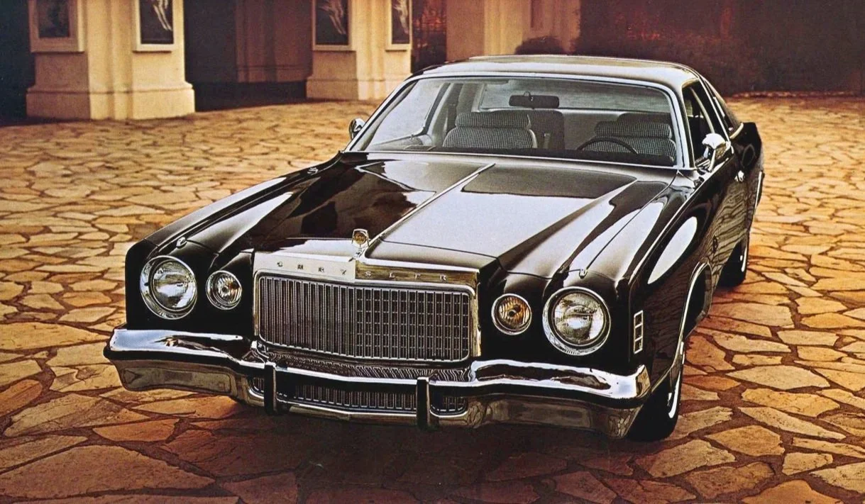 Link to vintage Chrysler Cordoba print ads (mid-1970s). Image focuses on the luxurious Cordoba featuring 'Corinthian leather'.