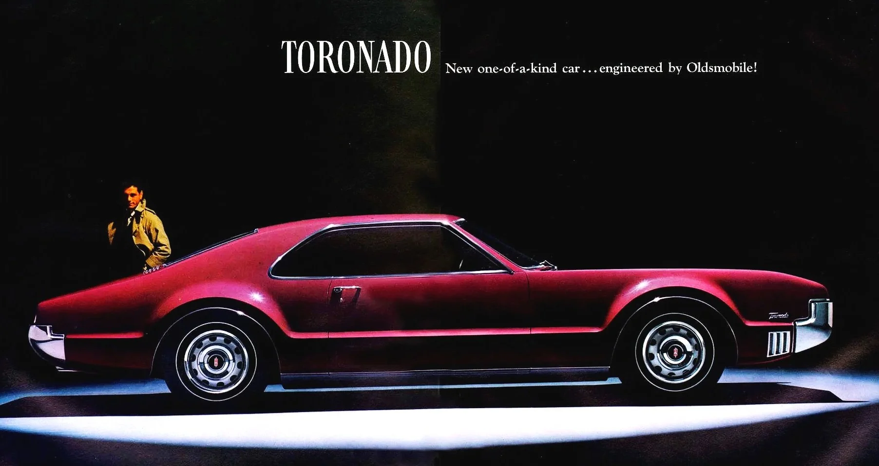 Link to Oldsmobile Toronado factory literature and print ads. Image showcases an early avant-garde Toronado front-wheel-drive design.